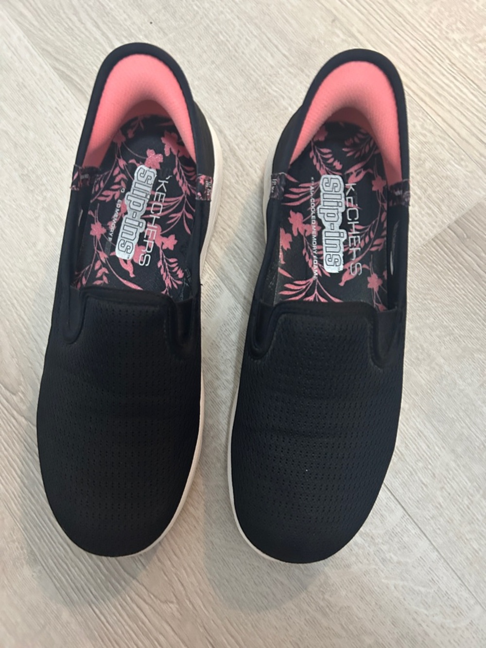 Skechers Black Slip-On Sneakers with Pink Lining and Floral Insole